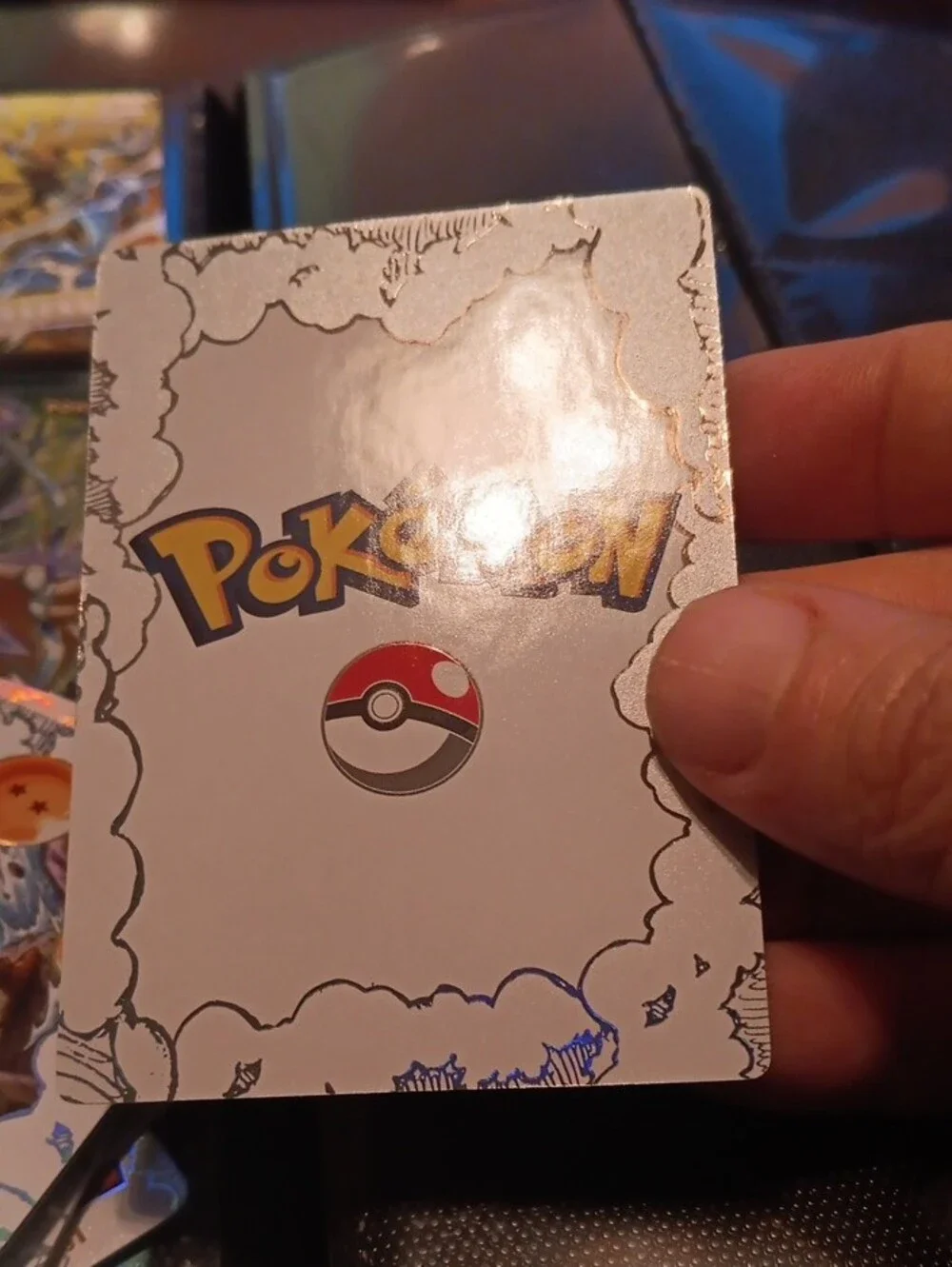 Pokemon trading card with orange and gold accents